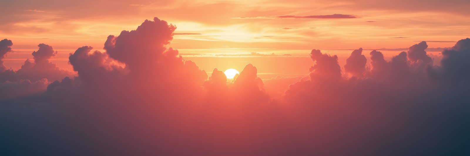 Orange and red hues dominate the sky as the sun sets